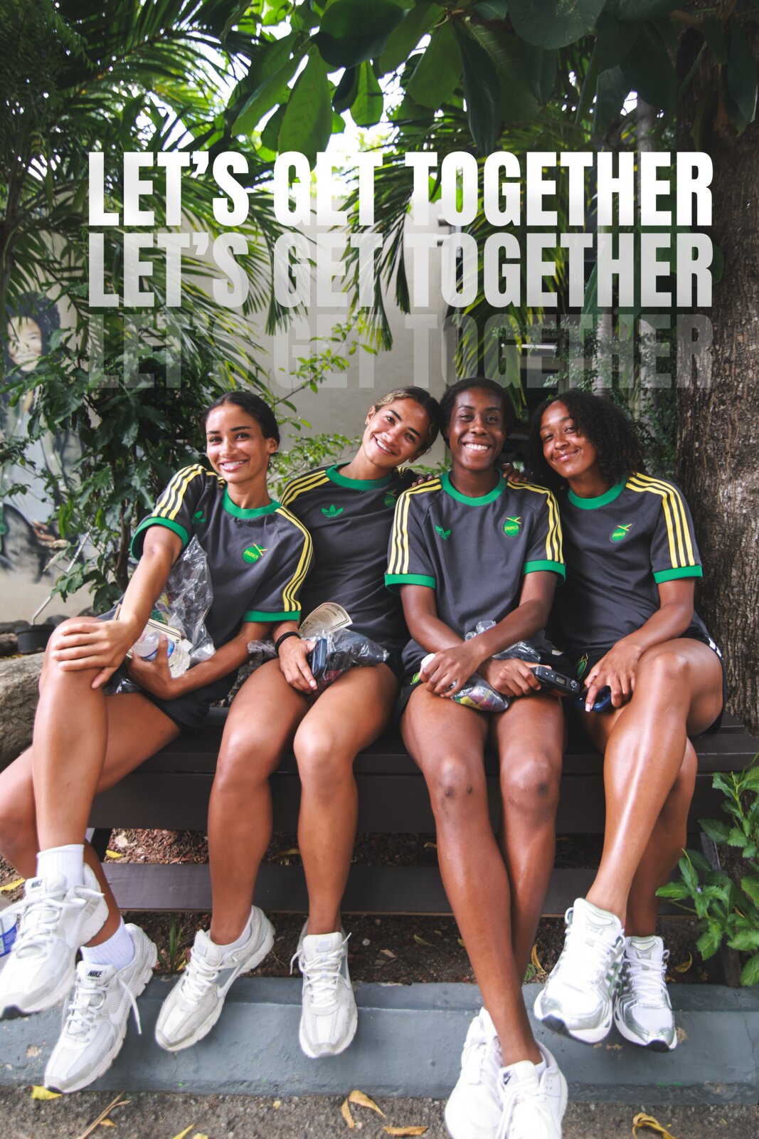 Four Reggae Girlz smile together in the adidas Bob Marley collab kit under Let's Get Together type
