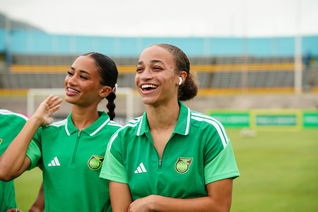 Two players share a laugh during the pitch walk