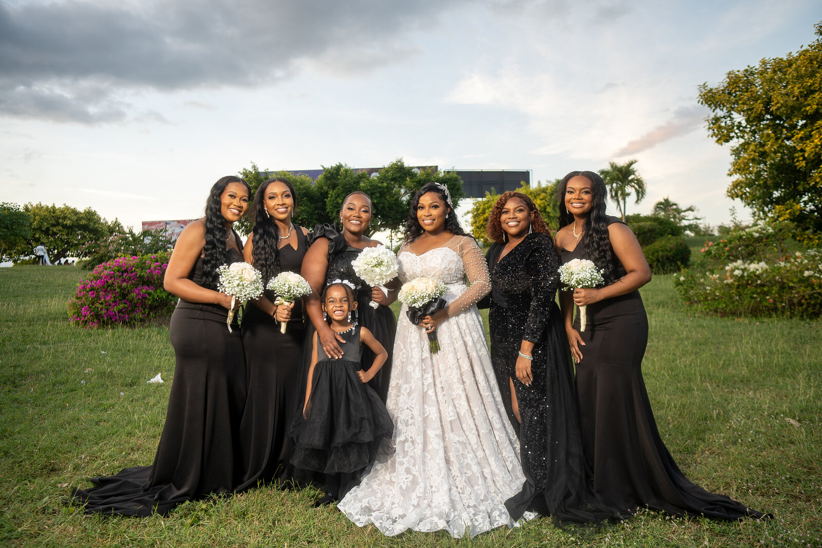 The bride with her black-tie wedding party