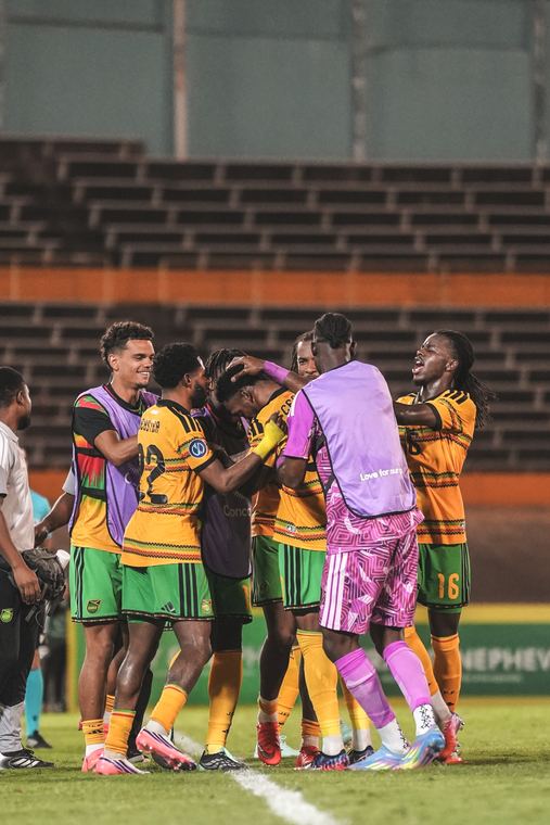 The team celebrates the winning goal together