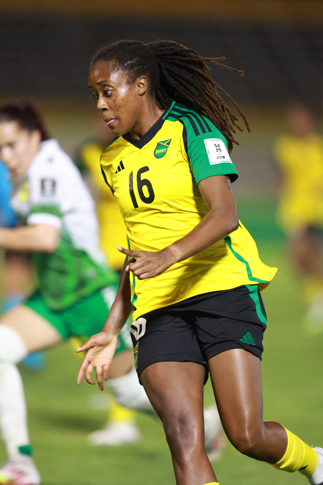 Number sixteen drives forward late in the qualifier against Guyana