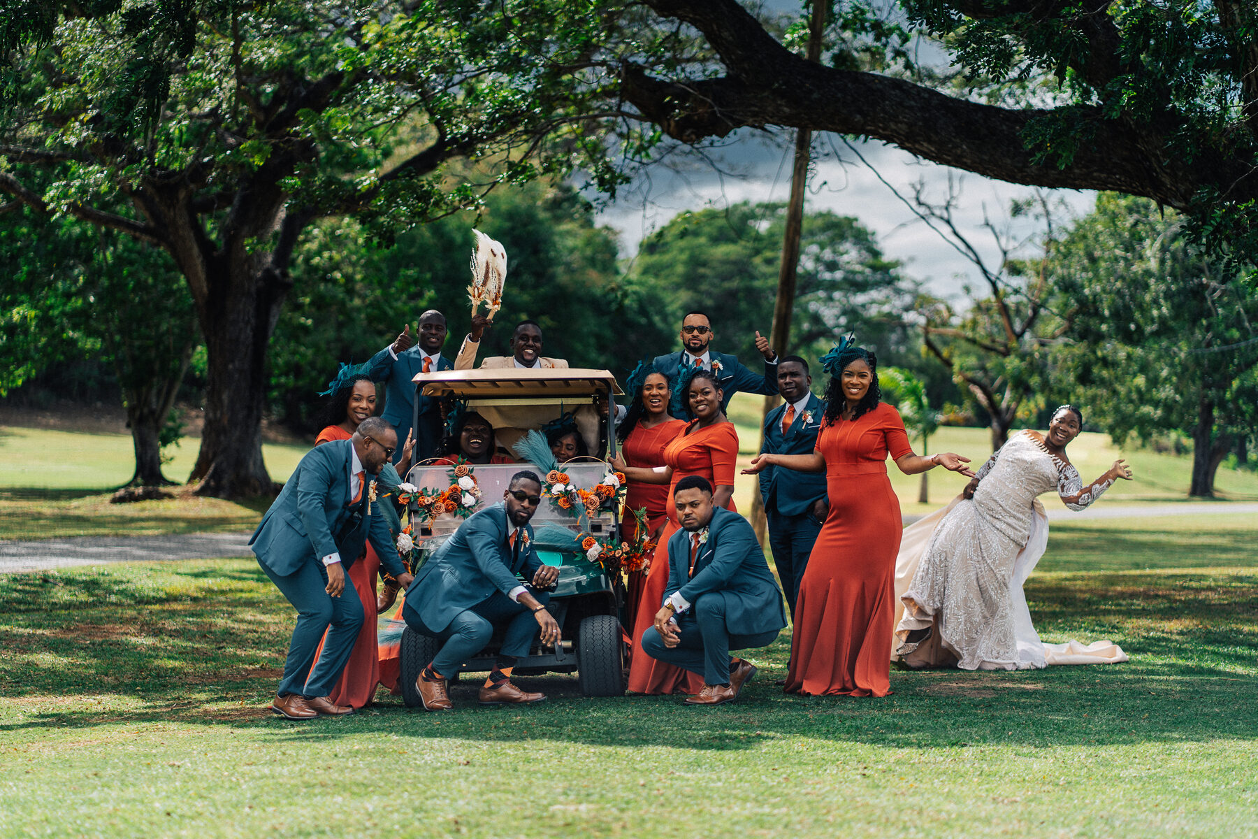 A wedding ceremony under a decorated arch with seated guests