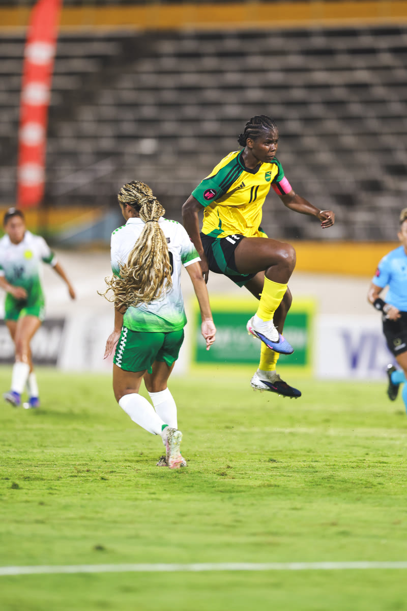 Bunny Shaw rises off the ground in the first half