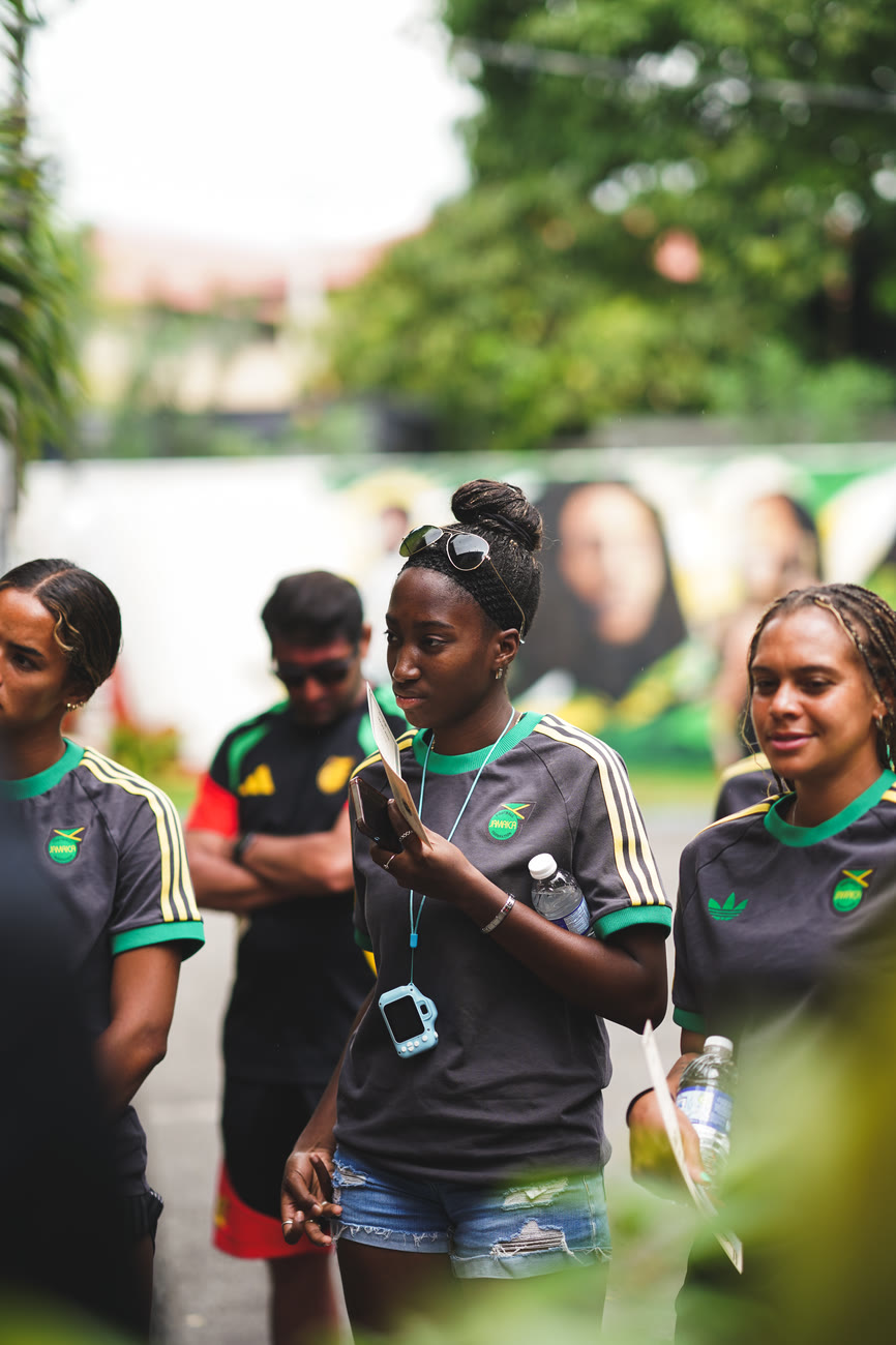 Players laugh together in the museum grounds